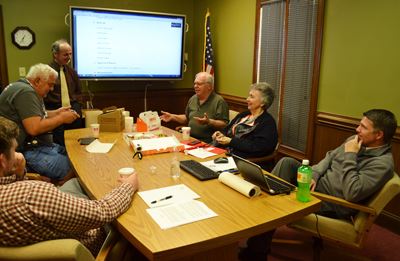 A committee meeting takes place