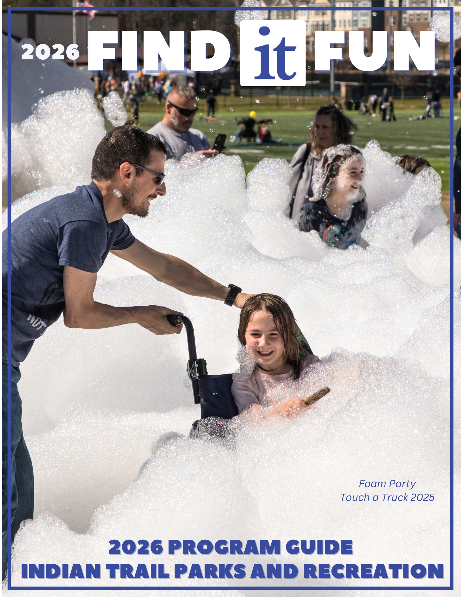  2026 Program Guide Cover Photo of a child in the foam party at touch a truck. 