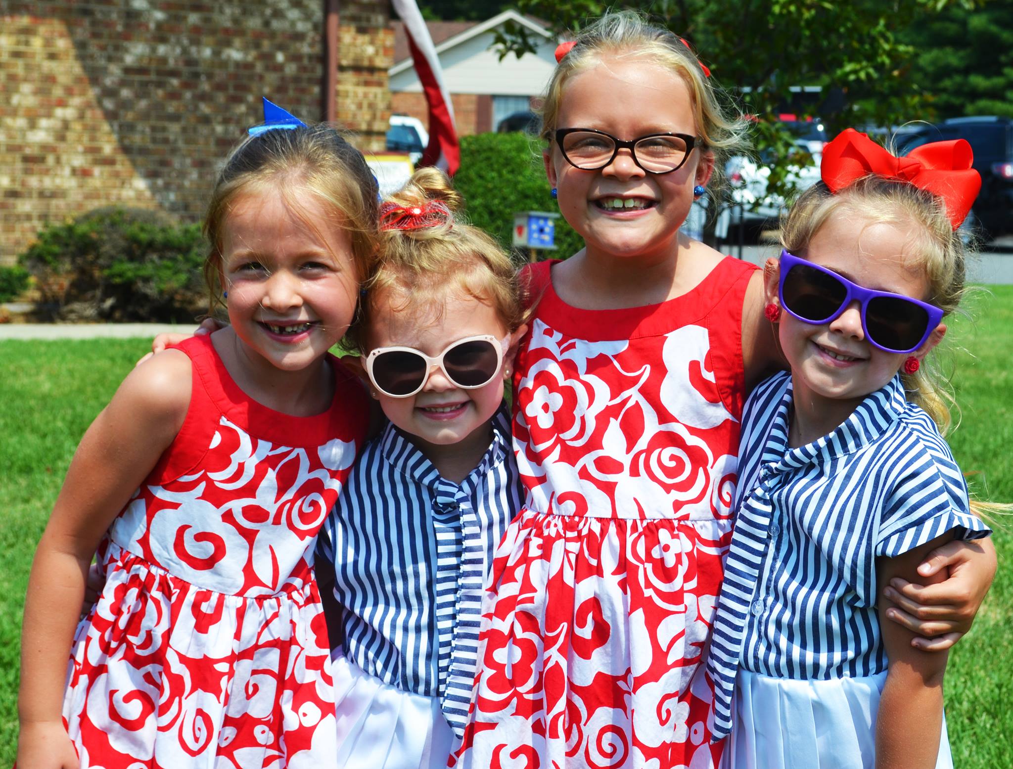 Kids smile together at the parade
