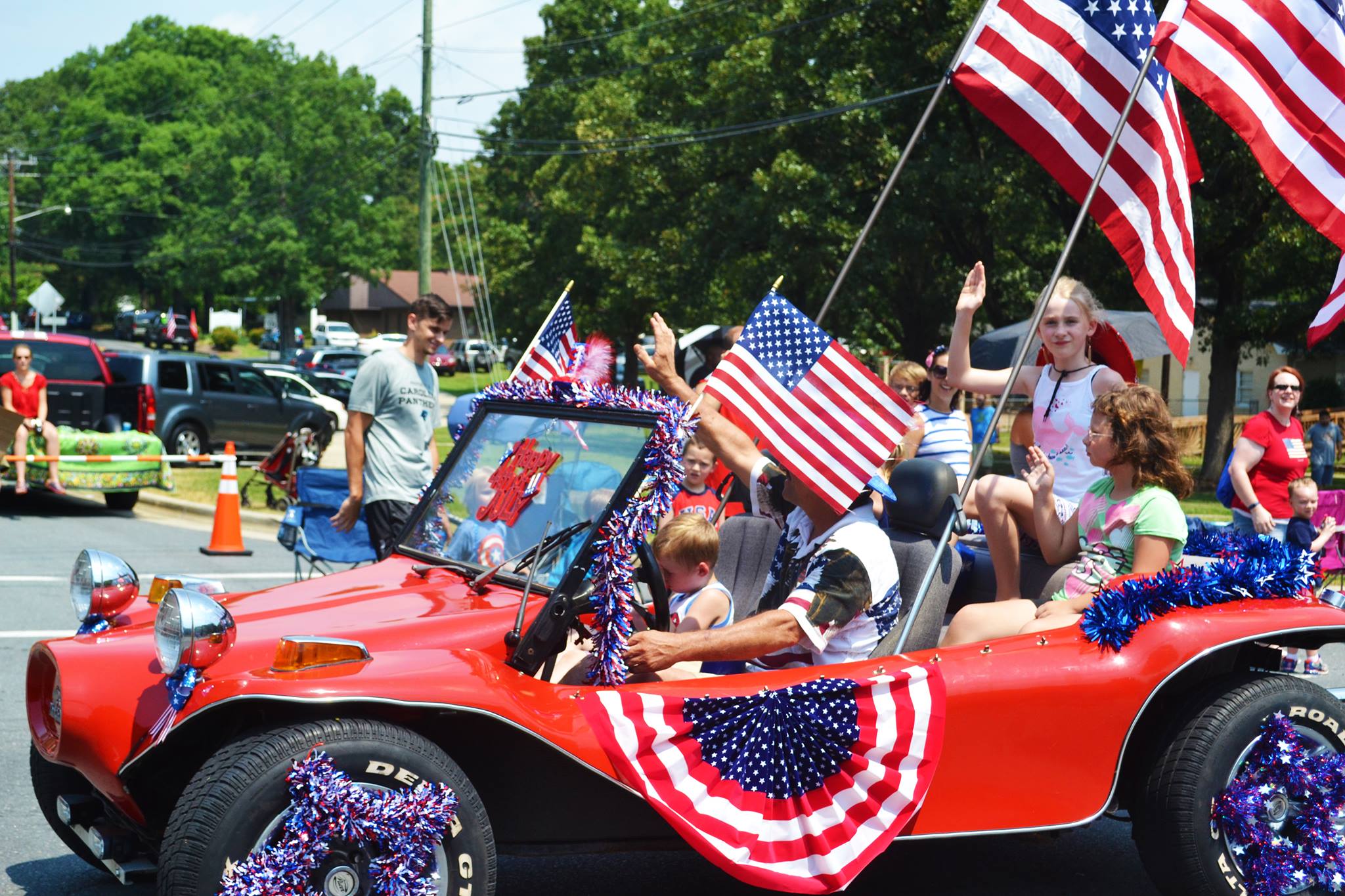 A parade float drives by