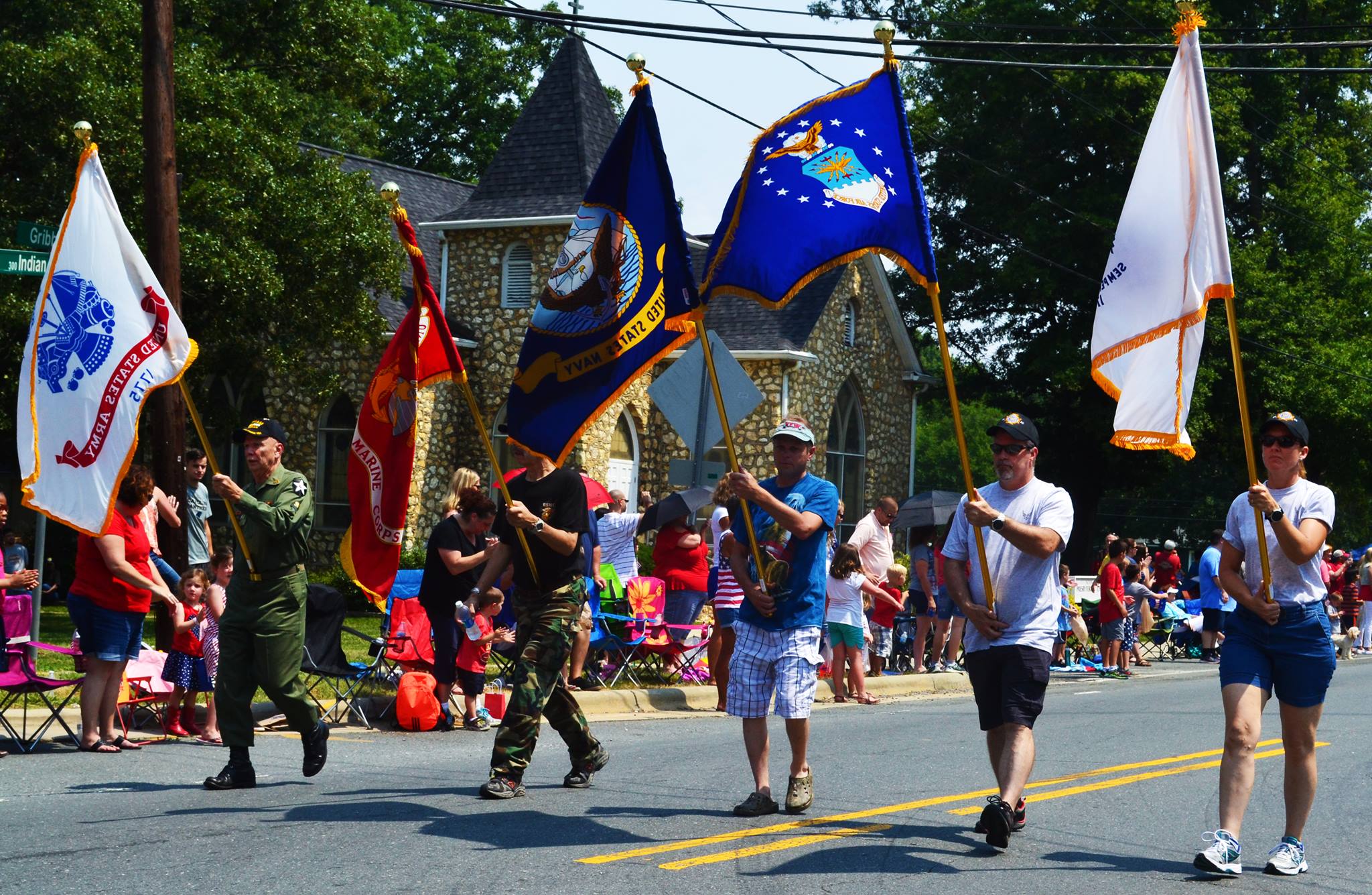 Flags are displayed in the parade
