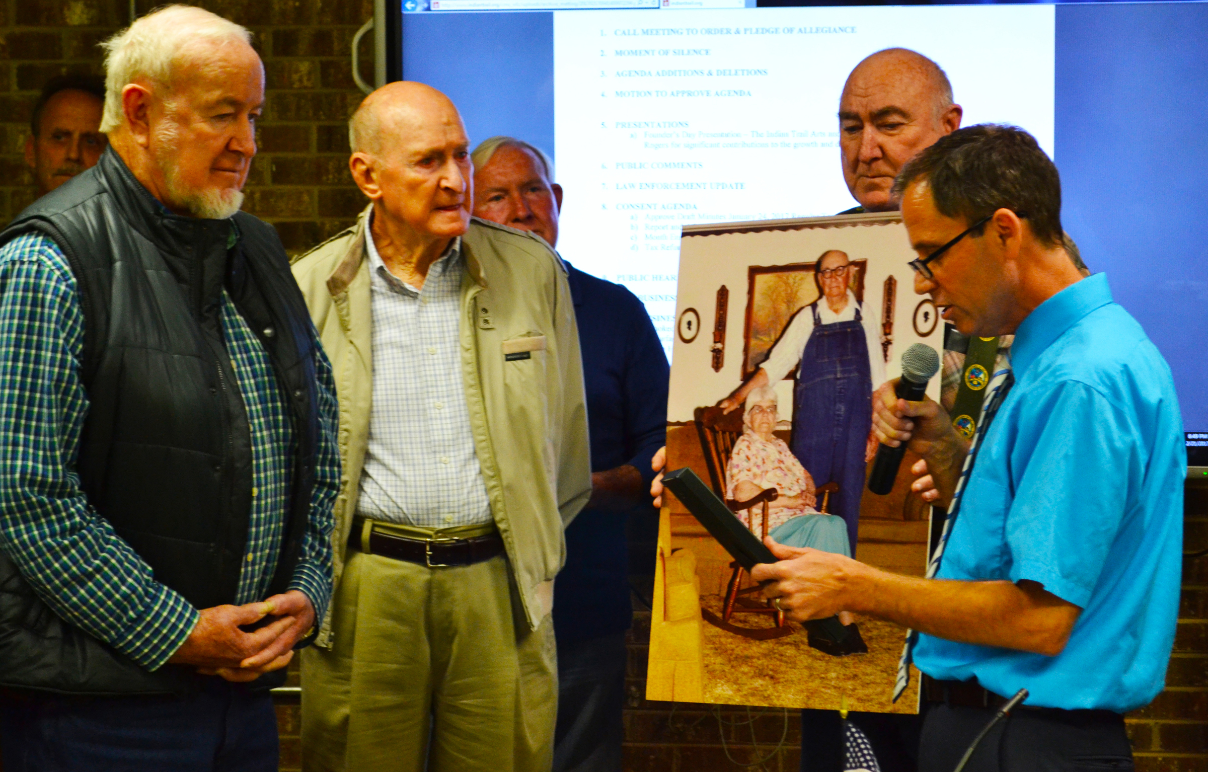 The Rogers family with Mayor Alvarez.